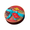 Round box of Sohan Gol Saediniya sugar-free sweets, wrapped with a turquoise ribbon and a red tag